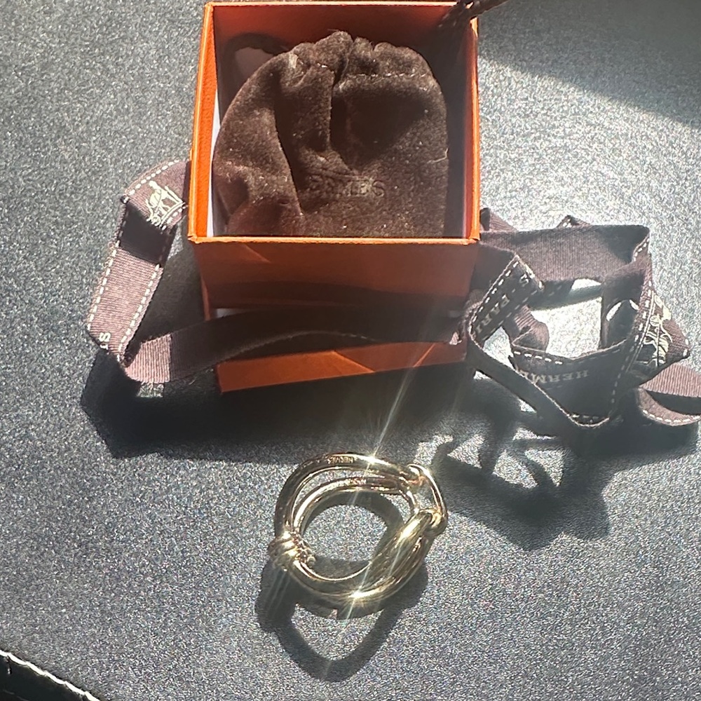 Authentic brand new never used Hermes Gold Knot Scarf Ring
